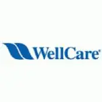 A blue and white logo of wellcare